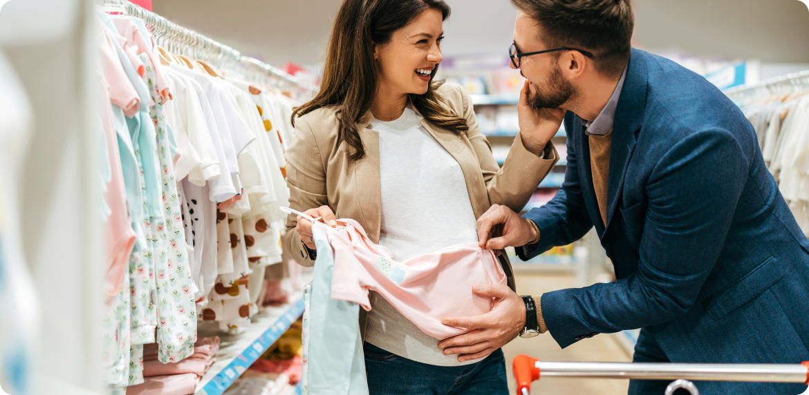 A family couple purchasing goods at a retail store